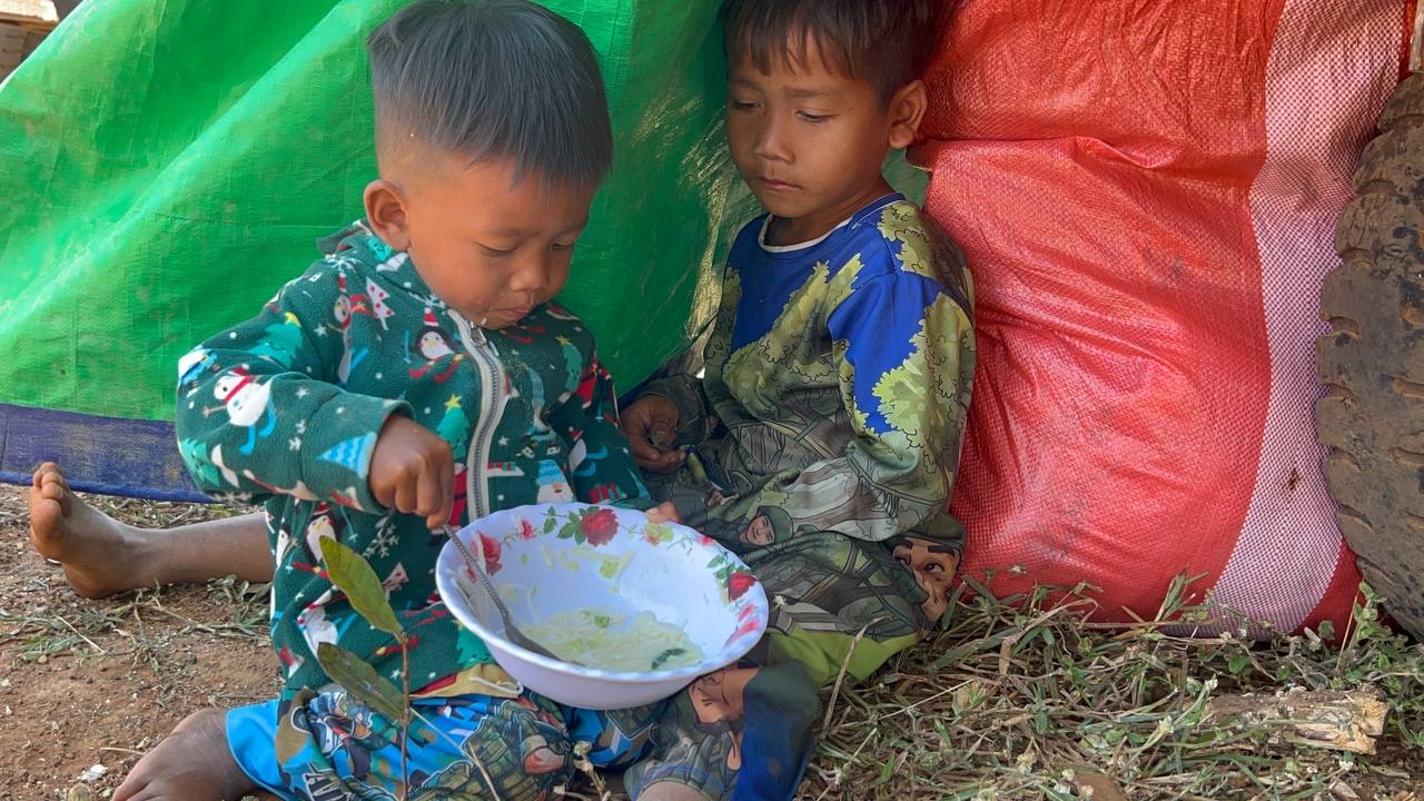Children sharing a bowl