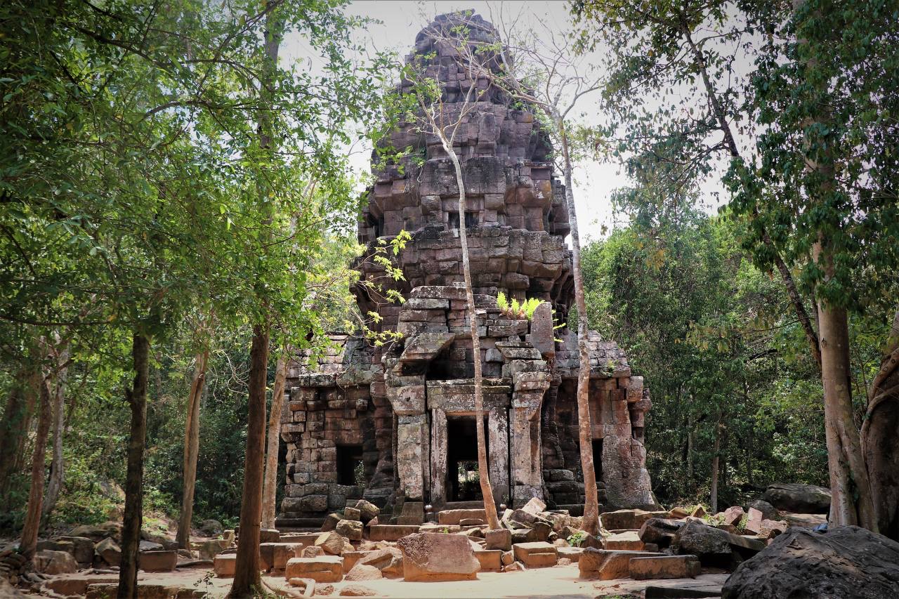 A temple held by jungle and time